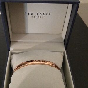 Ted Baker gold color logo bangle in box